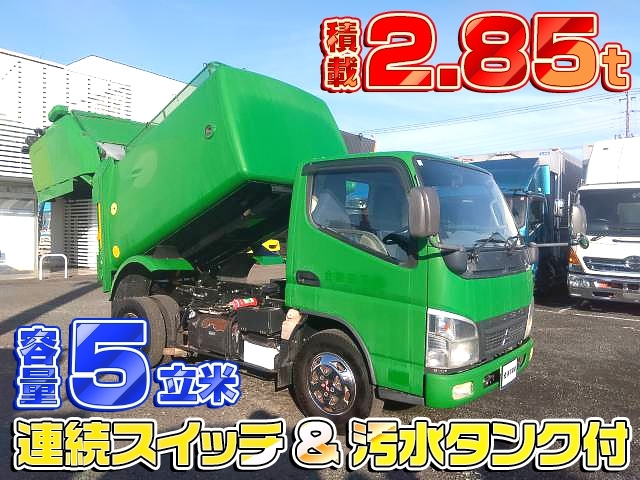 [塵芥車] H22 キャンター 巻き込み式パッカー 容量5立米 積載2.85t 連続スイッチ&汚水タンク有り